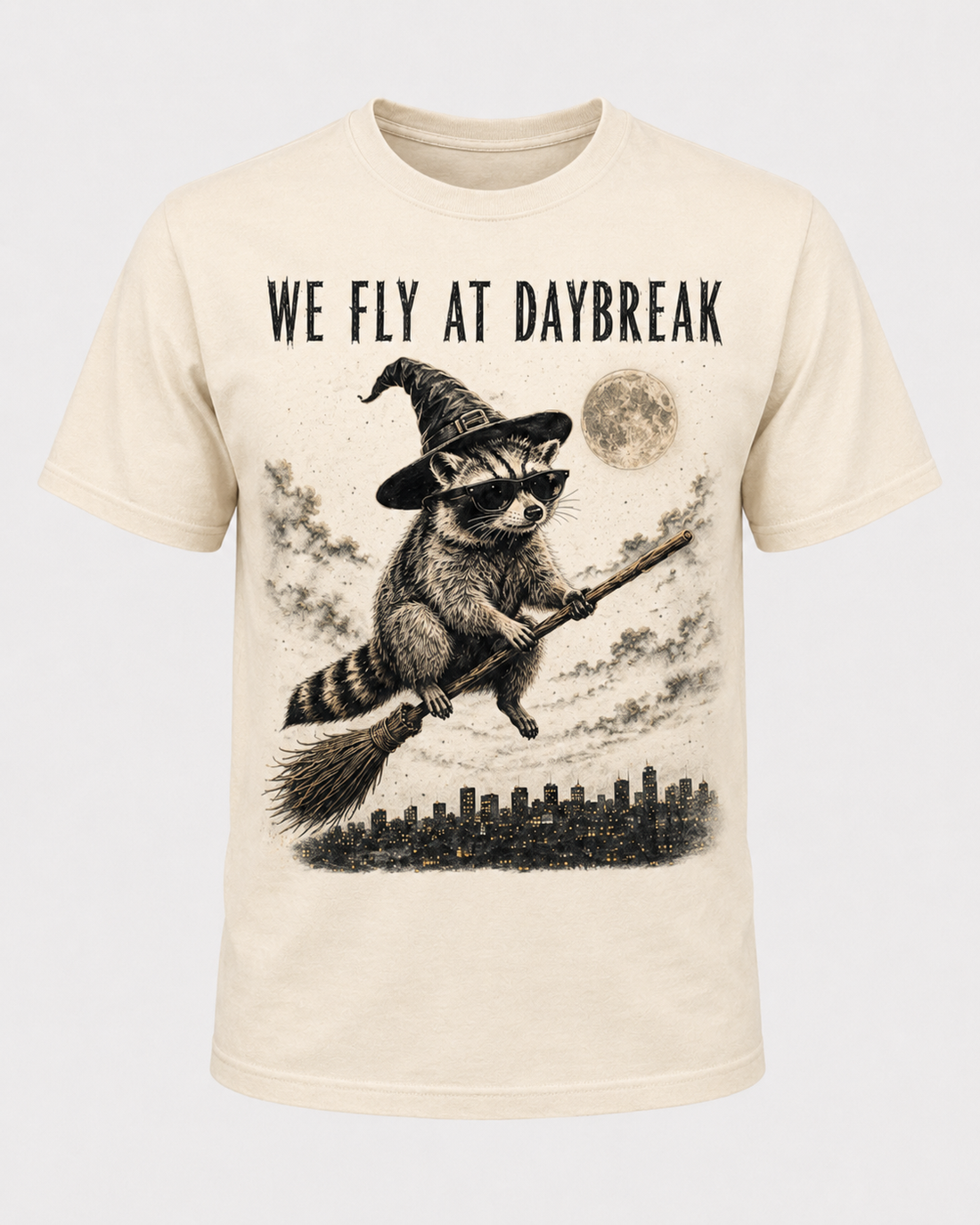 We Fly at Daybreak Raccoon Halloween Shirt, Witch Raccoon Broomstick Tee, Spooky Trash Panda Halloween Gift - T-Shirt Comfort Colors
