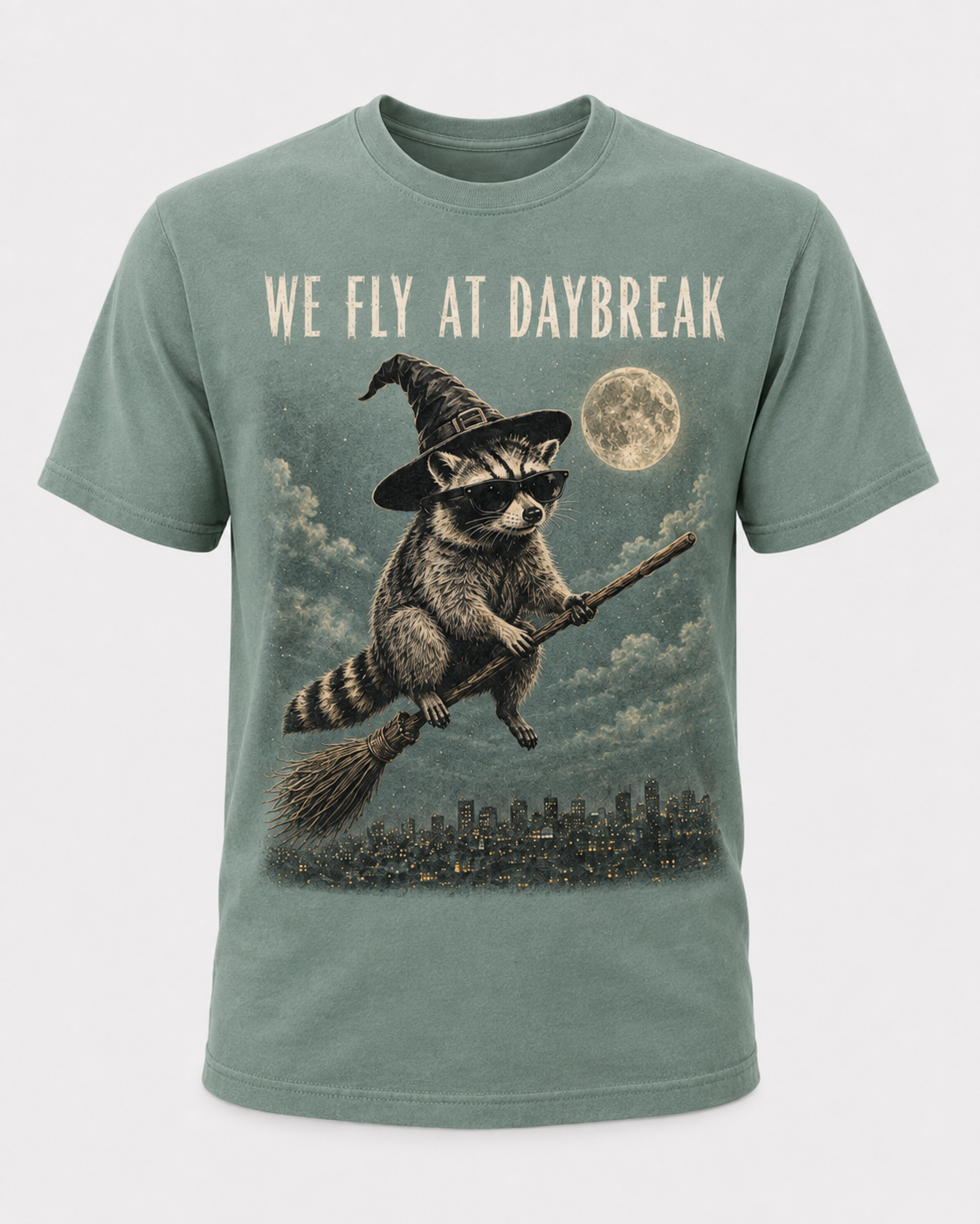 We Fly at Daybreak Raccoon Halloween Shirt, Witch Raccoon Broomstick Tee, Spooky Trash Panda Halloween Gift - T-Shirt Comfort Colors